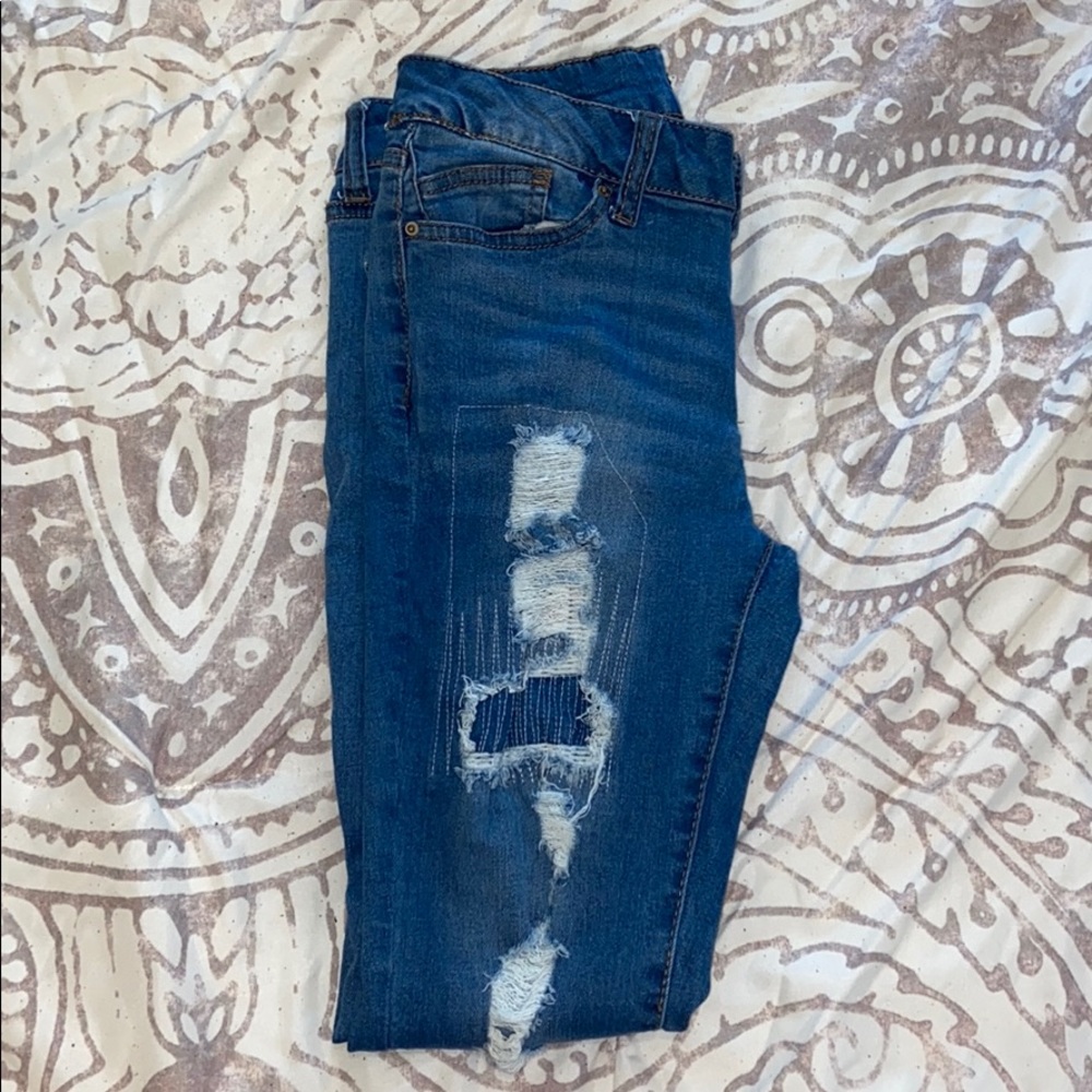 mid-wash ripped skinny jeans